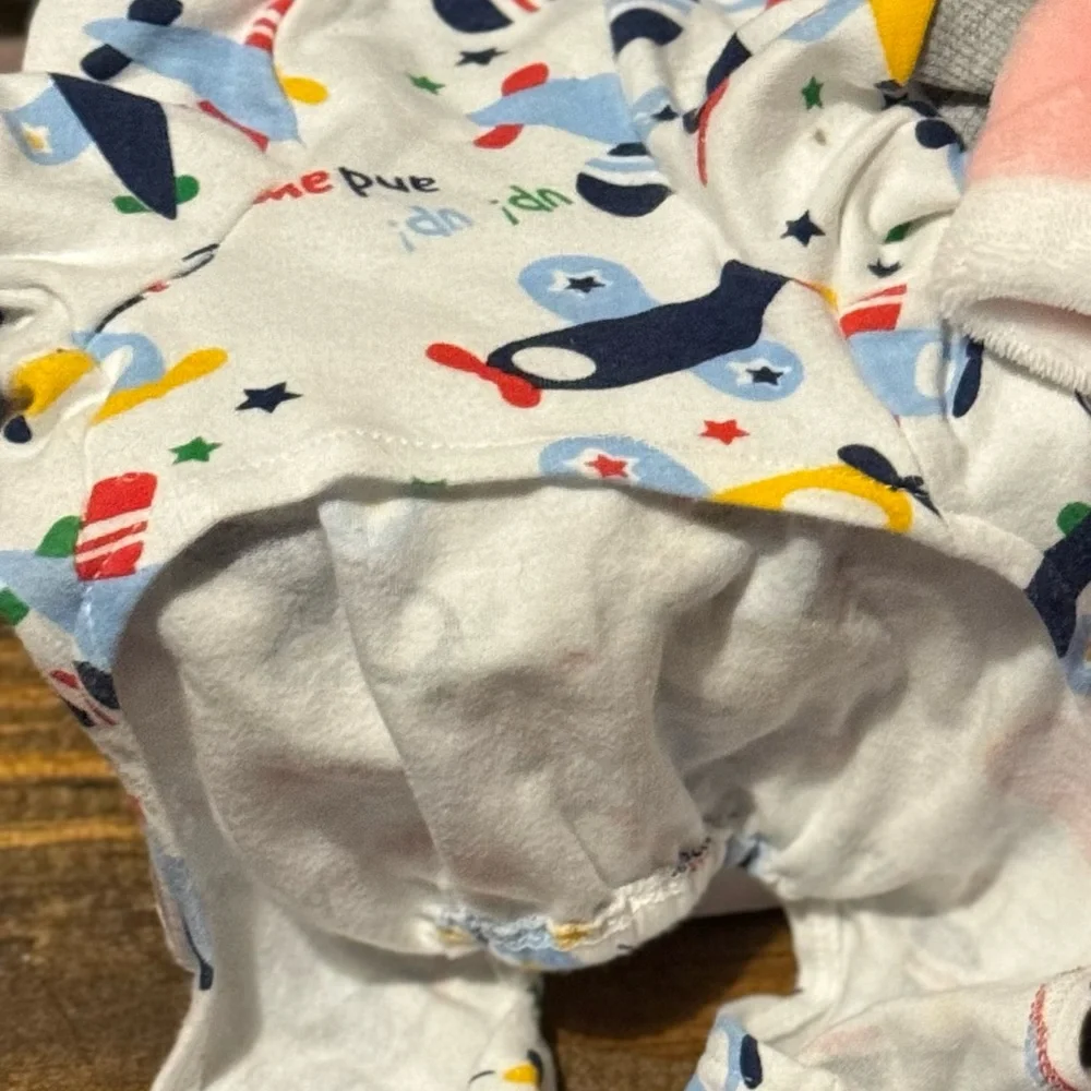 5 small dog pjs and shirts. $10 for all